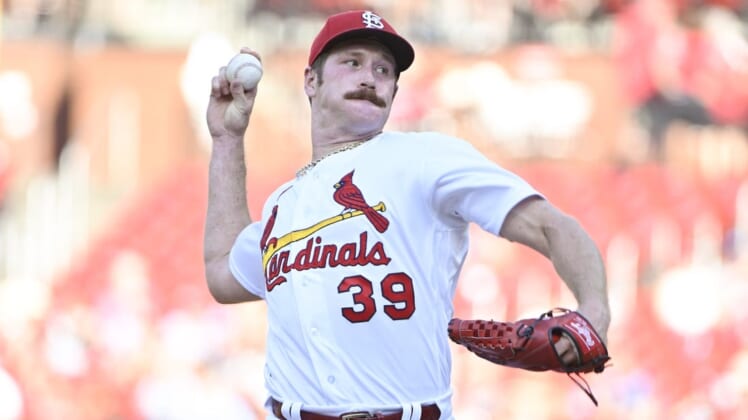 Jul 11, 2022; St. Louis, Missouri, USA;  St. Louis Cardinals starting pitcher Miles Mikolas (39) pitches against the Philadelphia Phillies during the first inning at Busch Stadium. Mandatory Credit: Jeff Curry-USA TODAY Sports