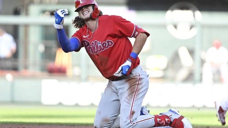 Jul 11, 2022; St. Louis, Missouri, USA;  Philadelphia Phillies third baseman Alec Bohm (28) reacts after he injured his hand sliding in at second base and was tagged out by St. Louis Cardinals second baseman Nolan Gorman (not pictured) during the second inning at Busch Stadium. Mandatory Credit: Jeff Curry-USA TODAY Sports