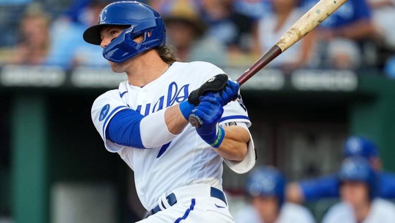 Jul 11, 2022; Kansas City, Missouri, USA; Kansas City Royals shortstop Bobby Witt Jr. (7) hits an RBI double against the Detroit Tigers during the first inning at Kauffman Stadium. Mandatory Credit: Jay Biggerstaff-USA TODAY Sports