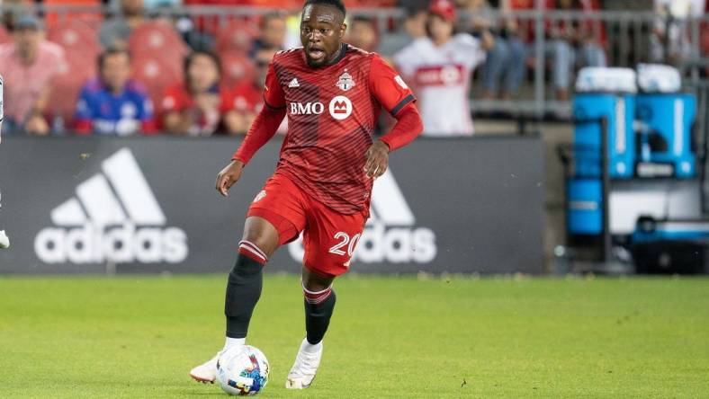 Jul 9, 2022; Toronto, Ontario, CAN; Toronto FC forward Ayo Akinola (20) controls the ball against the San Jose Earthquakes during the second half at BMO Field. Mandatory Credit: Nick Turchiaro-USA TODAY Sports