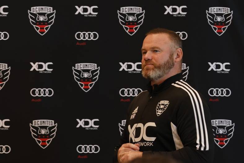 Jul 12, 2022; Washington, DC, USA; D.C. United new head coach Wayne Rooney walks to the stage for an introductory press conference at Audi Field. Mandatory Credit: Geoff Burke-USA TODAY Sports