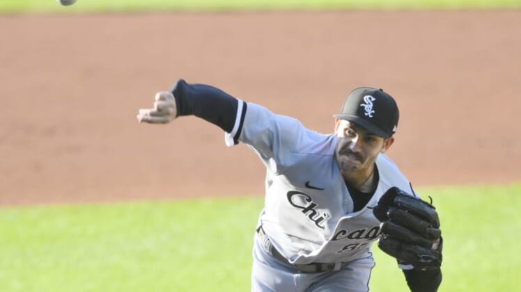 Jul 12, 2022; Cleveland, Ohio, USA; Chicago White Sox starting pitcher Dylan Cease (84) delivers a pitch in the first inning against the Cleveland Guardians at Progressive Field. Mandatory Credit: David Richard-USA TODAY Sports