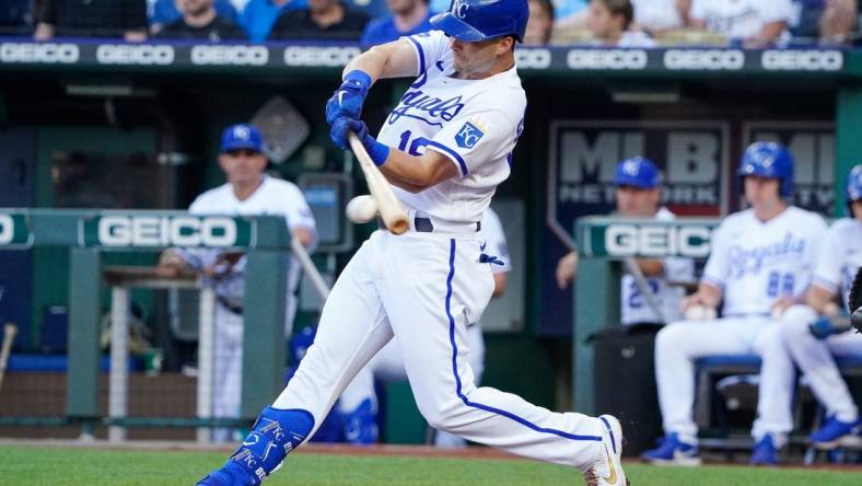 Jul 12, 2022; Kansas City, Missouri, USA; Kansas City Royals left fielder Andrew Benintendi (16) hits a one run single against theDetroit Tigers in the first inning at Kauffman Stadium. Mandatory Credit: Denny Medley-USA TODAY Sports