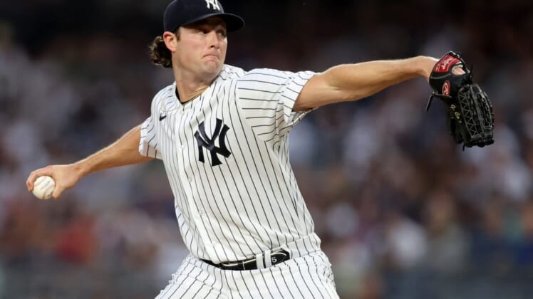 Jul 12, 2022; Bronx, New York, USA; New York Yankees starting pitcher Gerrit Cole (45) pitches against the Cincinnati Reds during the first inning at Yankee Stadium. Mandatory Credit: Brad Penner-USA TODAY Sports