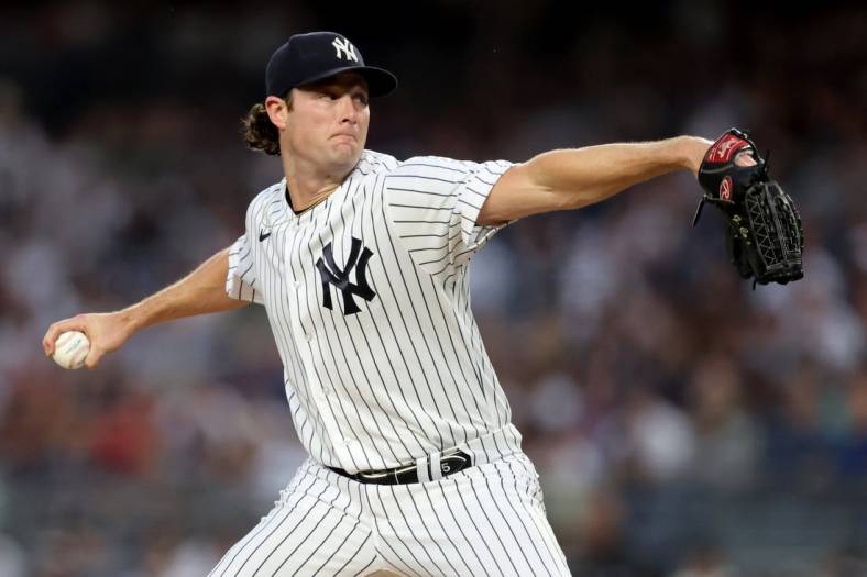 Jul 12, 2022; Bronx, New York, USA; New York Yankees starting pitcher Gerrit Cole (45) pitches against the Cincinnati Reds during the first inning at Yankee Stadium. Mandatory Credit: Brad Penner-USA TODAY Sports