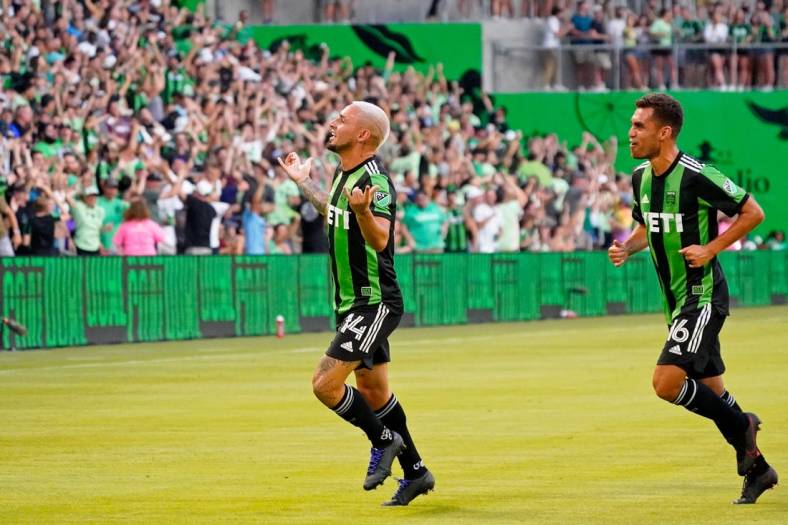 Jul 12, 2022; Austin, Texas, USA; Austin FC forward Diego Fagundez (14) celebrates after scoring a goal against the Houston Dynamo during the first half at Q2 Stadium. Mandatory Credit: Scott Wachter-USA TODAY Sports