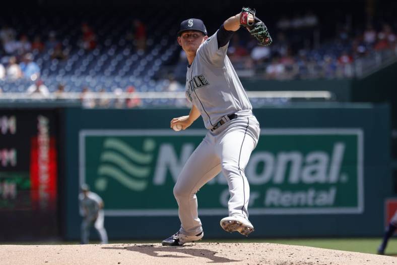 Jul 13, 2022; Washington, District of Columbia, USA; Seattle Mariners starting pitcher Chris Flexen (77) pitches against the Washington Nationals during the first inning at Nationals Park. Mandatory Credit: Geoff Burke-USA TODAY Sports