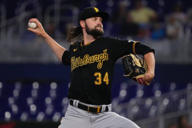 Jul 13, 2022; Miami, Florida, USA; Pittsburgh Pirates starting pitcher JT Brubaker (34) delivers a pitch in the first inning against the Miami Marlins at loanDepot park. Mandatory Credit: Jasen Vinlove-USA TODAY Sports