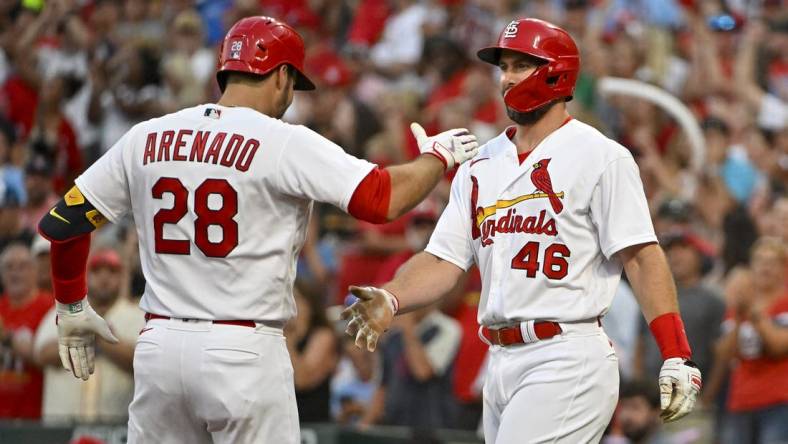 Jul 13, 2022; St. Louis, Missouri, USA;  St. Louis Cardinals third baseman Nolan Arenado (28) celebrates with first baseman Paul Goldschmidt (46) after hitting a two run home run against the Los Angeles Dodgers during the third inning at Busch Stadium. Mandatory Credit: Jeff Curry-USA TODAY Sports