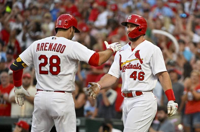 Jul 13, 2022; St. Louis, Missouri, USA;  St. Louis Cardinals third baseman Nolan Arenado (28) celebrates with first baseman Paul Goldschmidt (46) after hitting a two run home run against the Los Angeles Dodgers during the third inning at Busch Stadium. Mandatory Credit: Jeff Curry-USA TODAY Sports