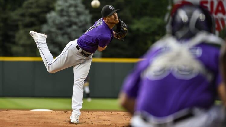 Jul 13, 2022; Denver, Colorado, USA; Colorado Rockies starting pitcher Chad Kuhl (41) throws a pitch in the first inning against San Diego Padres at Coors Field. Mandatory Credit: John Leyba-USA TODAY Sports