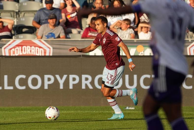 Jul 13, 2022; Commerce City, Colorado, USA; Colorado Rapids defender Steven Beitashour (33) drives to the net in the first half against the Orlando City at Dick's Sporting Goods Park. Mandatory Credit: Ron Chenoy-USA TODAY Sports