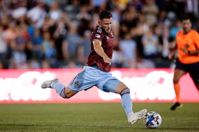 Jul 13, 2022; Commerce City, Colorado, USA; Colorado Rapids defender Keegan Rosenberry (2) kicks the ball in the second half against Orlando City SC at Dick's Sporting Goods Park. Mandatory Credit: Isaiah J. Downing-USA TODAY Sports