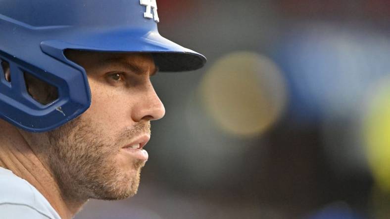 Jul 13, 2022; St. Louis, Missouri, USA;  Los Angeles Dodgers first baseman Freddie Freeman (5) looks on from the dugout before a agama against the St. Louis Cardinals at Busch Stadium. Mandatory Credit: Jeff Curry-USA TODAY Sports