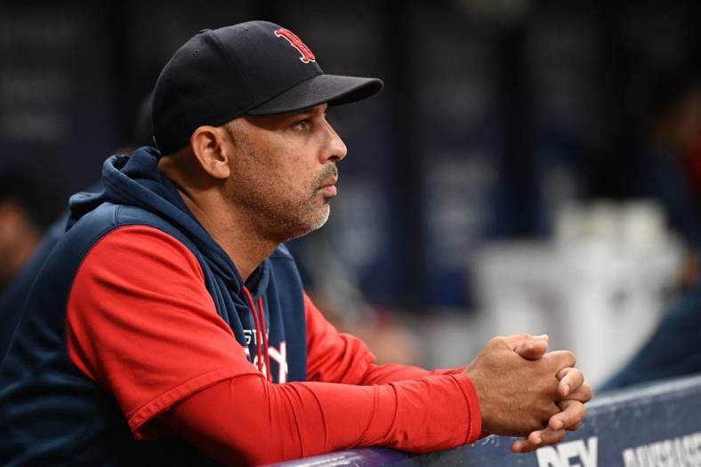 Jul 11, 2022; St. Petersburg, Florida, USA; Boston Red Sox manager Alex Cora (13) looks on in the second inning against the Tampa Bay Rays at Tropicana Field. Mandatory Credit: Jonathan Dyer-USA TODAY Sports