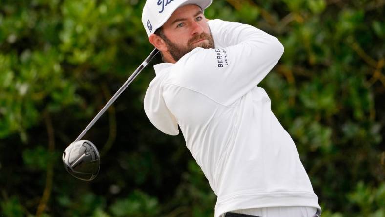 Jul 14, 2022; St. Andrews, SCT; Cameron Young tees off on the third hole during the first round of the 150th Open Championship golf tournament at St. Andrews Old Course. Mandatory Credit: Michael Madrid-USA TODAY Sports