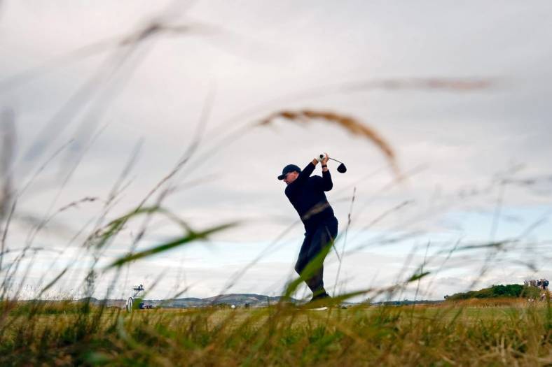 Jul 14, 2022; St. Andrews, SCT; Phil Mickelson tees off on the 17th hole during the first round of the 150th Open Championship golf tournament at St. Andrews Old Course. Mandatory Credit: Rob Schumacher-USA TODAY Sports