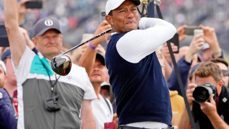 Jul 14, 2022; St. Andrews, SCT; Tiger Woods tees off on the fourth hole during the first round of the 150th Open Championship golf tournament at St. Andrews Old Course. Mandatory Credit: Michael Madrid-USA TODAY Sports