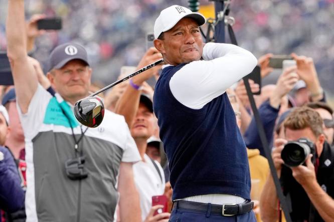 Jul 14, 2022; St. Andrews, SCT; Tiger Woods tees off on the fourth hole during the first round of the 150th Open Championship golf tournament at St. Andrews Old Course. Mandatory Credit: Michael Madrid-USA TODAY Sports