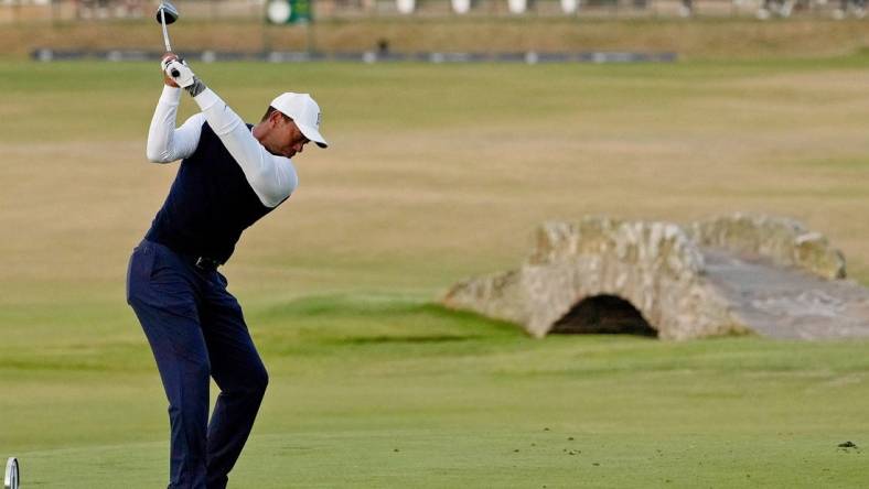 Jul 14, 2022; St. Andrews, SCT; Tiger Woods tees off on the 18th hole during the first round of the 150th Open Championship golf tournament at St. Andrews Old Course. Mandatory Credit: Michael Madrid-USA TODAY Sports