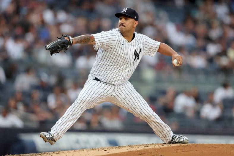 Jul 14, 2022; Bronx, New York, USA; New York Yankees starting pitcher Nestor Cortes (65) pitches against the Cincinnati Reds during the second inning at Yankee Stadium. Mandatory Credit: Brad Penner-USA TODAY Sports