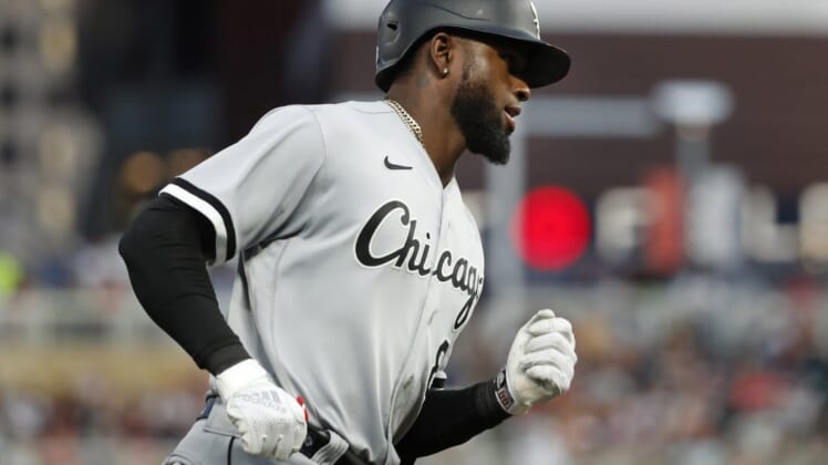 Jul 14, 2022; Minneapolis, Minnesota, USA; Chicago White Sox center fielder Luis Robert (88) runs the bases on his grand slam home run against the Minnesota Twins in the fourth inning at Target Field. Mandatory Credit: Bruce Kluckhohn-USA TODAY Sports
