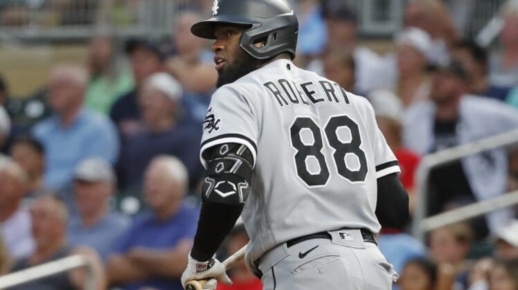 Jul 14, 2022; Minneapolis, Minnesota, USA; Chicago White Sox center fielder Luis Robert (88) watches his grand slam against the Minnesota Twins in the fourth inning at Target Field. Mandatory Credit: Bruce Kluckhohn-USA TODAY Sports
