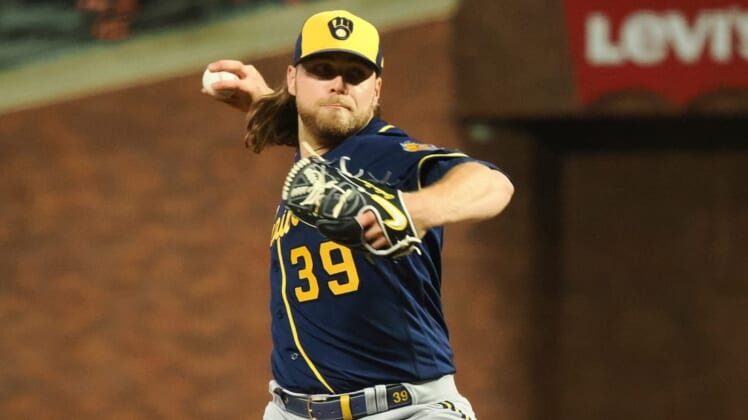 Jul 14, 2022; San Francisco, California, USA; Milwaukee Brewers starting pitcher Corbin Burnes (39) throws against the San Francisco Giants during the eighth inning at Oracle Park. Mandatory Credit: Kelley L Cox-USA TODAY Sports