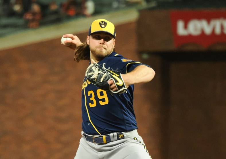 Jul 14, 2022; San Francisco, California, USA; Milwaukee Brewers starting pitcher Corbin Burnes (39) throws against the San Francisco Giants during the eighth inning at Oracle Park. Mandatory Credit: Kelley L Cox-USA TODAY Sports