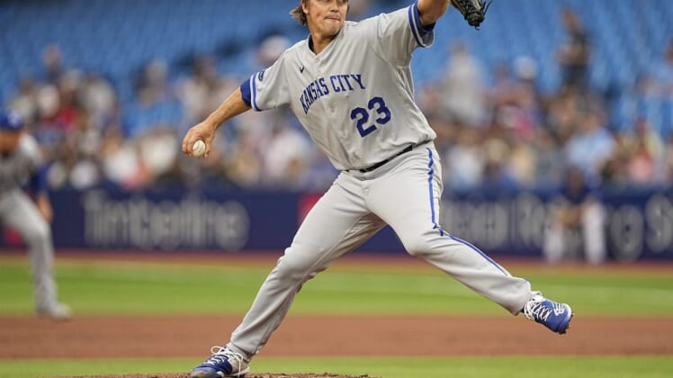 Jul 15, 2022; Toronto, Ontario, CAN; Kansas City Royals starting pitcher Zack Greinke (23) pitches to the Toronto Blue Jays during the first inning at Rogers Centre. Mandatory Credit: John E. Sokolowski-USA TODAY Sports