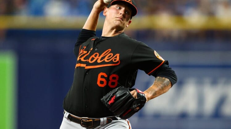 Jul 15, 2022; St. Petersburg, Florida, USA;  Baltimore Orioles starting pitcher Tyler Wells (68) throws against the Tampa Bay Rays in the second inning at Tropicana Field. Mandatory Credit: Nathan Ray Seebeck-USA TODAY Sports