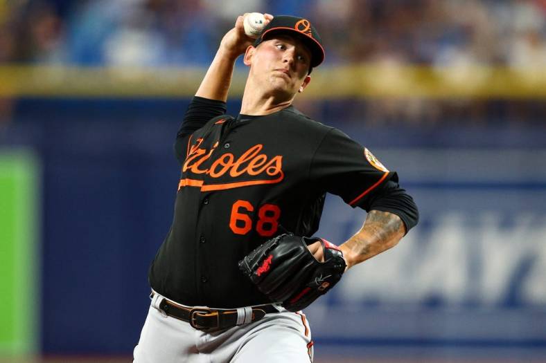 Jul 15, 2022; St. Petersburg, Florida, USA;  Baltimore Orioles starting pitcher Tyler Wells (68) throws against the Tampa Bay Rays in the second inning at Tropicana Field. Mandatory Credit: Nathan Ray Seebeck-USA TODAY Sports