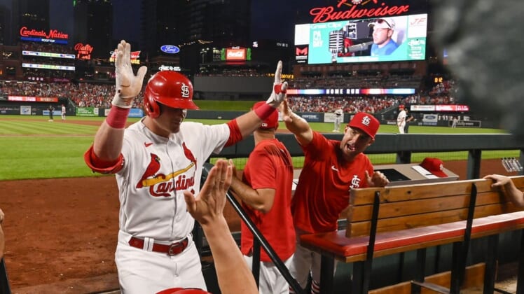 Jul 15, 2022; St. Louis, Missouri, USA;  St. Louis Cardinals designated hitter Nolan Gorman (16) is congratulated by bench coach Skip Schumaker (55) after hitting a solo home run against the Cincinnati Reds during the fourth inning at Busch Stadium. Mandatory Credit: Jeff Curry-USA TODAY Sports