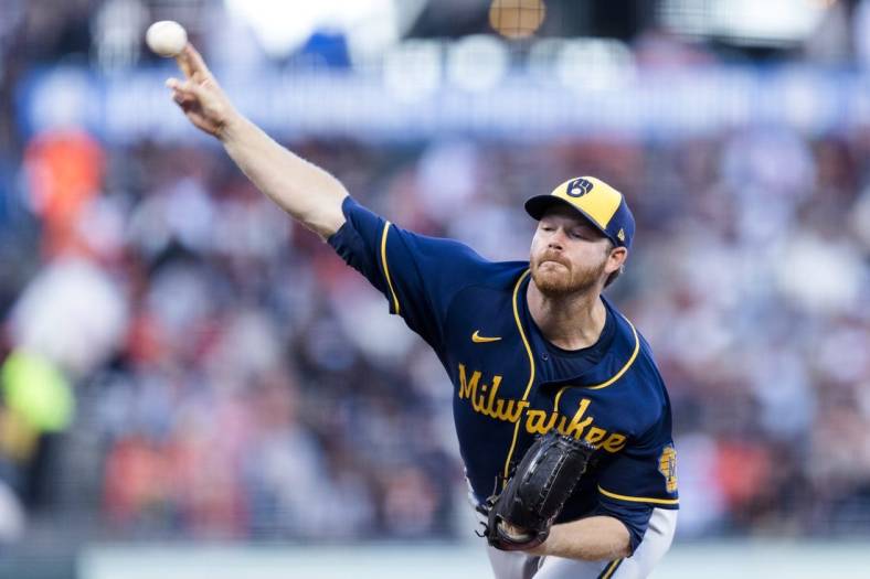 Jul 15, 2022; San Francisco, California, USA;  Milwaukee Brewers starting pitcher Brandon Woodruff (53) throws against the San Francisco Giants during the first inning at Oracle Park. Mandatory Credit: John Hefti-USA TODAY Sports