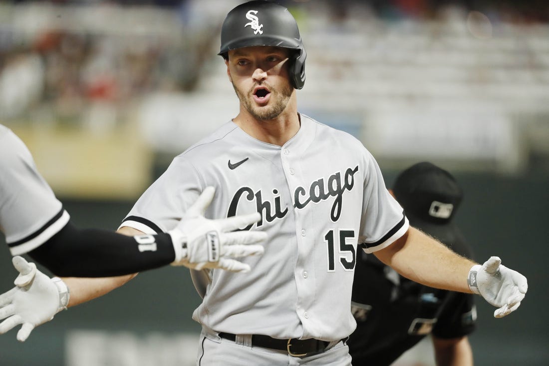 Jul 15, 2022; Minneapolis, Minnesota, USA; Chicago White Sox center fielder Adam Engel (15) celebrates his three-run home run against the Minnesota Twins in the seventh inning at Target Field. Mandatory Credit: Bruce Kluckhohn-USA TODAY Sports