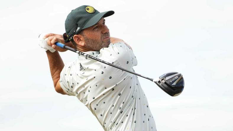 Jul 16, 2022; St. Andrews, SCT; Sergio Garcia hits his tee shot on the 14th hole during the third round of the 150th Open Championship golf tournament. Mandatory Credit: Rob Schumacher-USA TODAY Sports