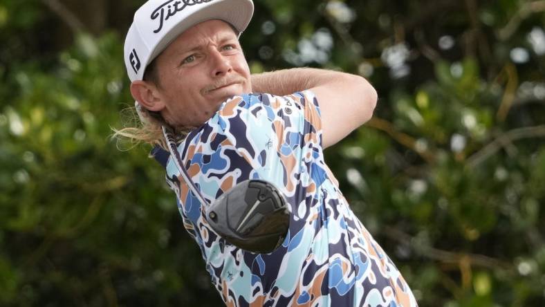 Jul 16, 2022; St. Andrews, Fife, SCT;  Cameron Smith hits his tee shot on the 3rd hole during the third round of the 150th Open Championship golf tournament. Mandatory Credit: Michael Madrid-USA TODAY Sports