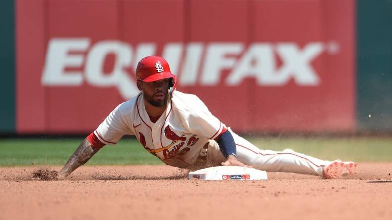 Jul 16, 2022; St. Louis, Missouri, USA; St. Louis Cardinals shortstop Edmundo Sosa (63) safely steals second base against the Cincinnati Reds in the fourth inning at Busch Stadium. Mandatory Credit: Joe Puetz-USA TODAY Sports