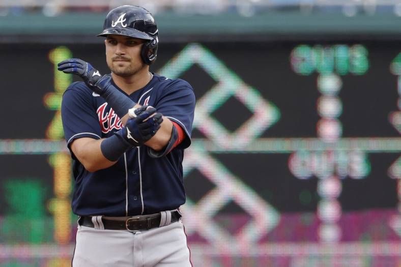 Jul 16, 2022; Washington, District of Columbia, USA; Atlanta Braves third baseman Austin Riley (27) gestures towards his dugout after hitting a double against the Washington Nationals during the first inning at Nationals Park. Mandatory Credit: Geoff Burke-USA TODAY Sports