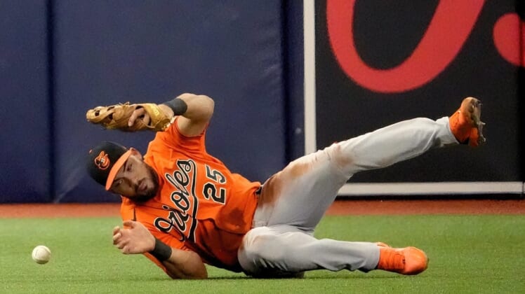 Jul 16, 2022; St. Petersburg, Florida, USA; Baltimore Orioles right fielder Anthony Santander (25) can not make a catch on a ball hit by Tampa Bay Rays right fielder Josh Lowe (15) at Tropicana Field. Mandatory Credit: Dave Nelson-USA TODAY Sports