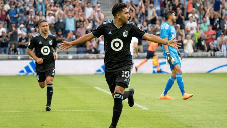 Jul 16, 2022; Saint Paul, Minnesota, USA; Minnesota United midfielder Emanuel Reynoso (10) celebrates after a goal against D.C. United in the first half at Allianz Field. Mandatory Credit: Matt Blewett-USA TODAY Sports