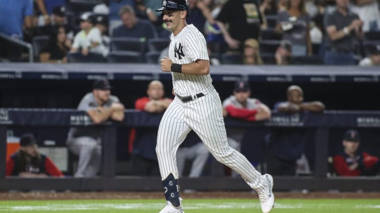 Jul 16, 2022; Bronx, New York, USA; New York Yankees right fielder Matt Carpenter (24) approaches home plate after hitting his second three run home run of the game in the fifth inning against the Boston Red Sox at Yankee Stadium. Mandatory Credit: Wendell Cruz-USA TODAY Sports