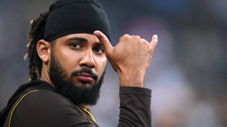 Jul 16, 2022; San Diego, California, USA; San Diego Padres shortstop Fernando Tatis Jr. (23) gestures toward the stands during the sixth inning against the Arizona Diamondbacks at Petco Park. Mandatory Credit: Orlando Ramirez-USA TODAY Sports