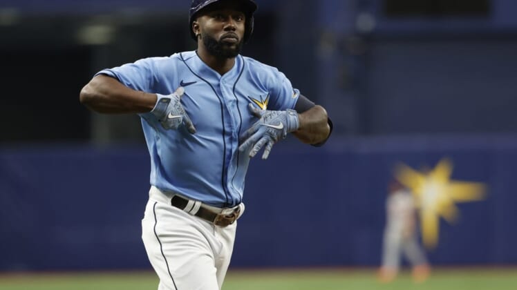 Jul 17, 2022; St. Petersburg, Florida, USA; Tampa Bay Rays left fielder Randy Arozarena (56) celebrates after he hits a two-run home run against the Baltimore Orioles during the first inning at Tropicana Field. Mandatory Credit: Kim Klement-USA TODAY Sports