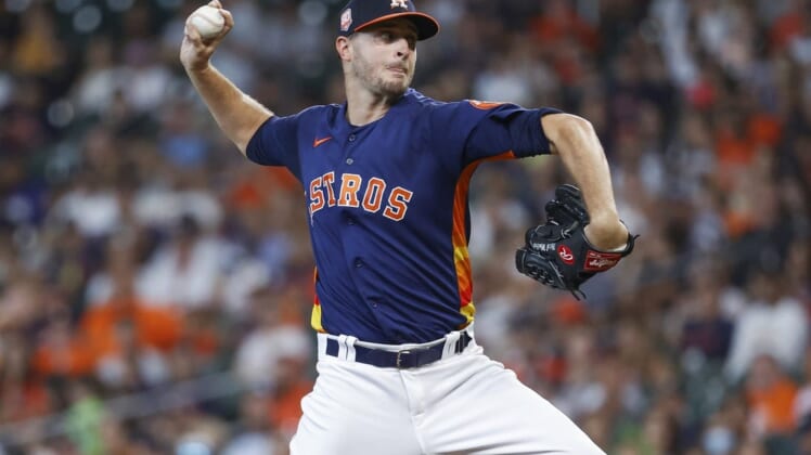 Jul 17, 2022; Houston, Texas, USA; Houston Astros starting pitcher Jake Odorizzi (17) delivers a pitch during the first inning against the Oakland Athletics at Minute Maid Park. Mandatory Credit: Troy Taormina-USA TODAY Sports