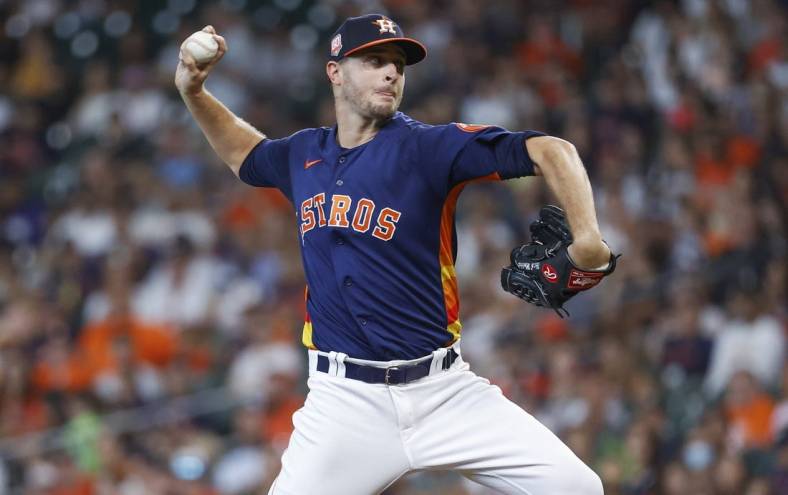 Jul 17, 2022; Houston, Texas, USA; Houston Astros starting pitcher Jake Odorizzi (17) delivers a pitch during the first inning against the Oakland Athletics at Minute Maid Park. Mandatory Credit: Troy Taormina-USA TODAY Sports