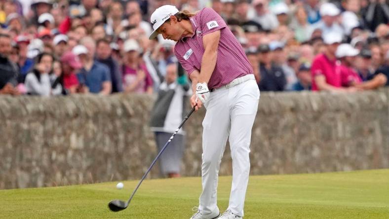 Jul 17, 2022; St. Andrews, SCT; Cameron Smith tees off on the 18th hole during the final round of the 150th Open Championship golf tournament at St. Andrews Old Course. Mandatory Credit: Michael Madrid-USA TODAY Sports