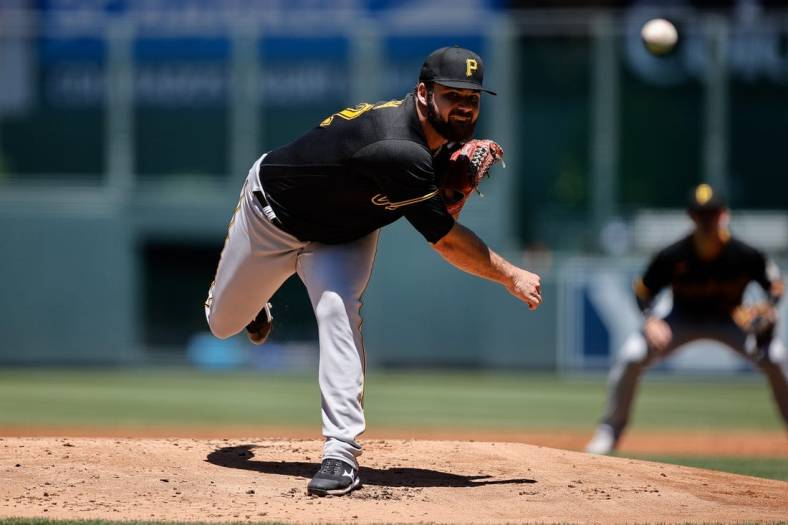 Jul 17, 2022; Denver, Colorado, USA; Pittsburgh Pirates starting pitcher Bryse Wilson (32) pitches in the first inning against the Colorado Rockies at Coors Field. Mandatory Credit: Isaiah J. Downing-USA TODAY Sports