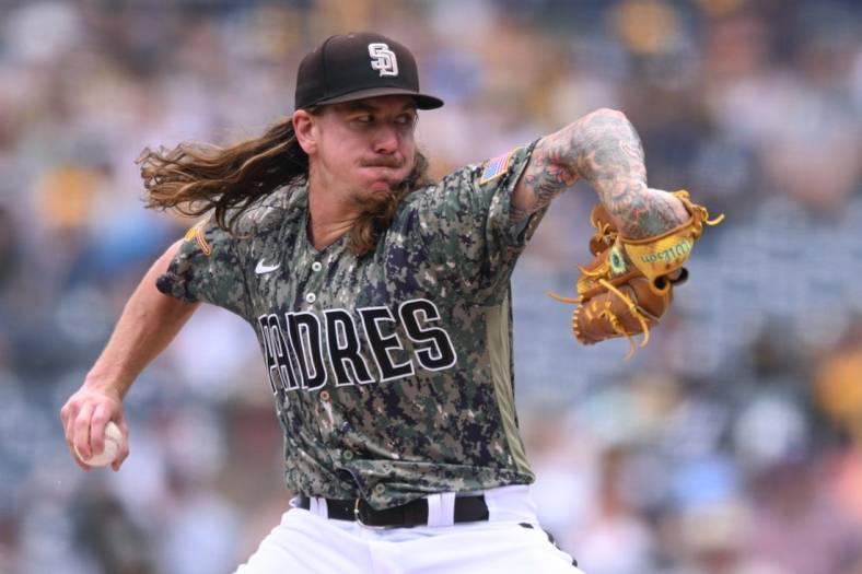 Jul 17, 2022; San Diego, California, USA; San Diego Padres starting pitcher Mike Clevinger (52) throws a pitch against the Arizona Diamondbacks during the first inning at Petco Park. Mandatory Credit: Orlando Ramirez-USA TODAY Sports