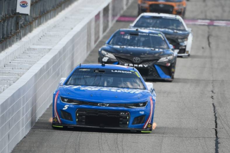 Jul 17, 2022; Loudon, New Hampshire, USA; NASCAR Cup Series driver Kyle Larson (5) races along the wall during the Ambetter 301 at New Hampshire Motor Speedway. Mandatory Credit: Eric Canha-USA TODAY Sports